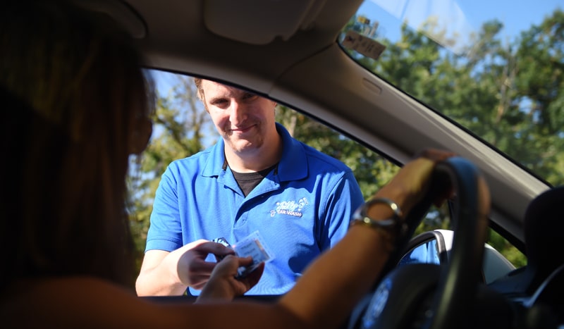 a man driving a car